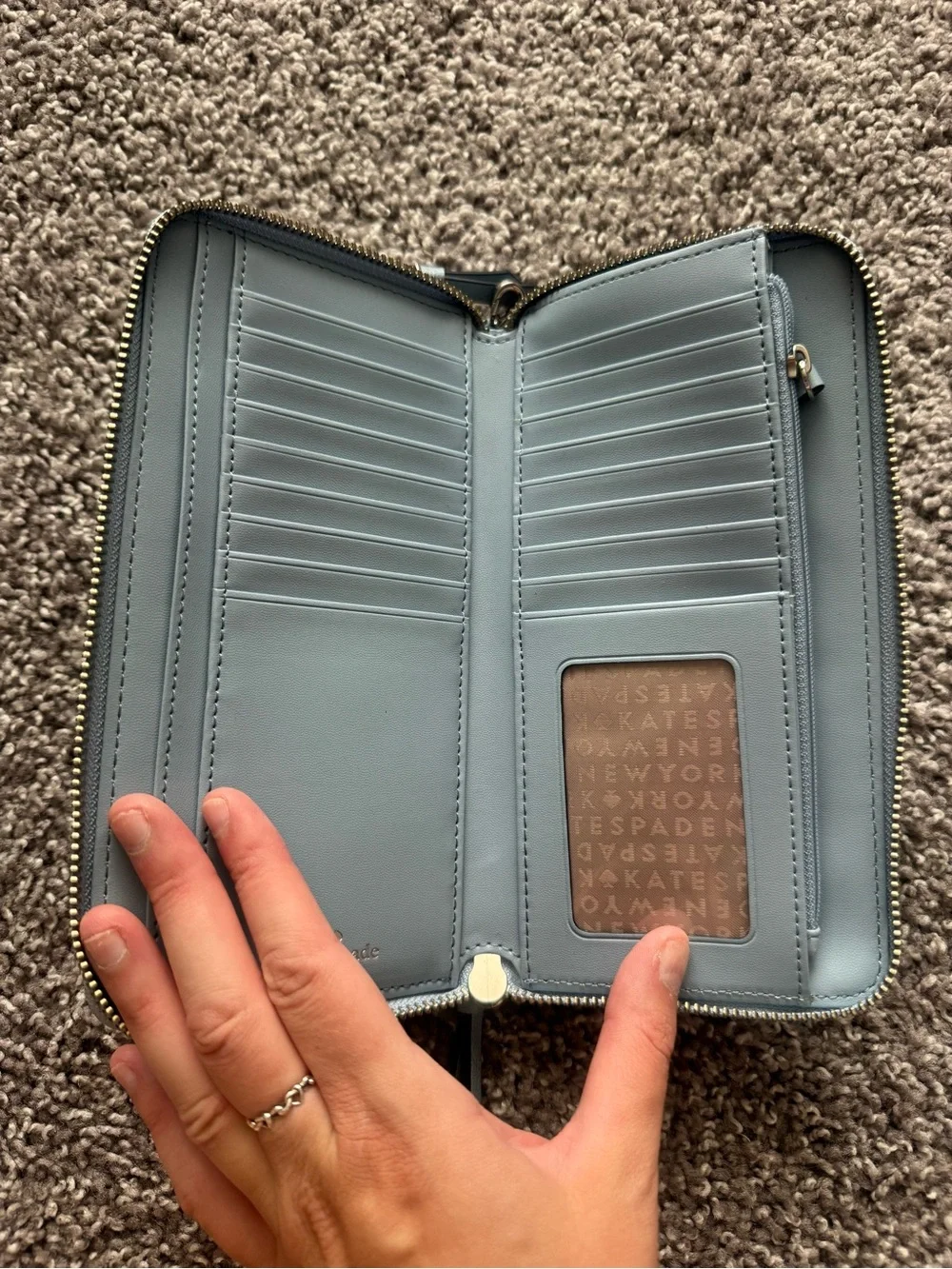 kate spade Light Blue Leather Wristlet Wallet with Gold Logo